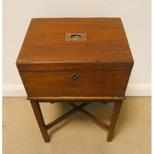 10 - A Victorian mahogany box on a stand with cross stretchers, lined as a workbox...