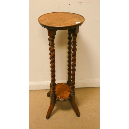 2 - A two tier circular oak plant or bust pedestal on barley twist columns