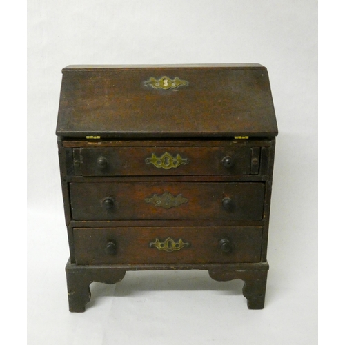 27 - A miniature Georgian mahogany bureau fitted three drawers, 8