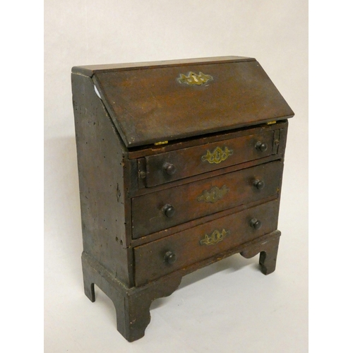 27 - A miniature Georgian mahogany bureau fitted three drawers, 8