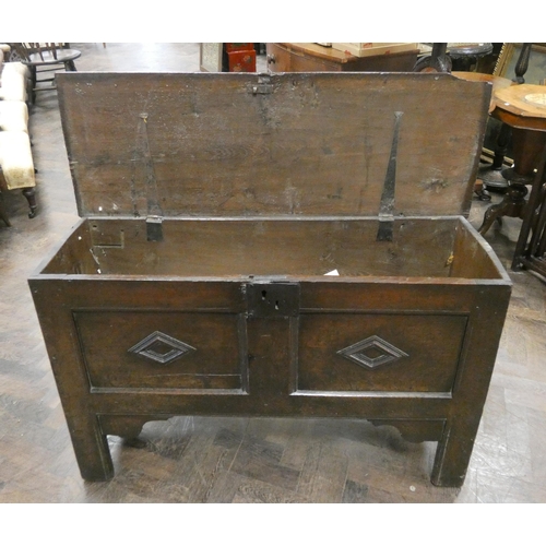 35 - An antique oak two panelled coffer, 46