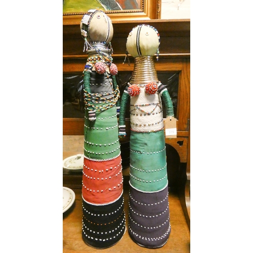 108 - A pair of modern chairs and two tall beaded upholstered doll figures (could be used as doorstops). T... 