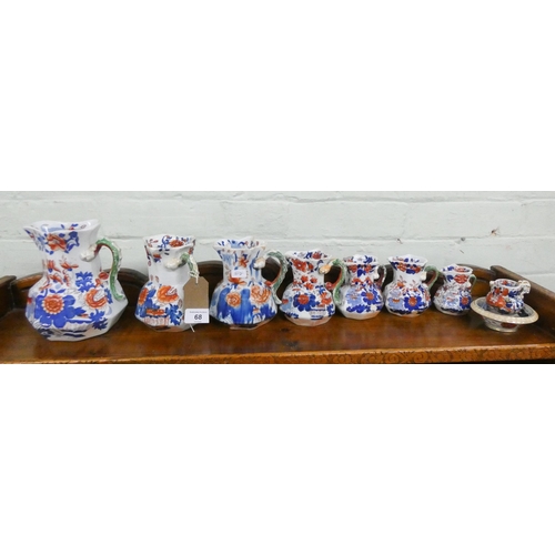 68 - A set of eight Masons Ironstone graduated jugs...