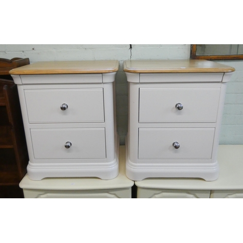 70 - A pair of good quality modern white bedside chests, each fitted two drawers with light oak tops