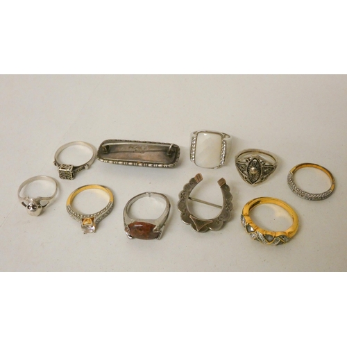 596 - Collection of ladies silver and other dress rings, silver brooches etc