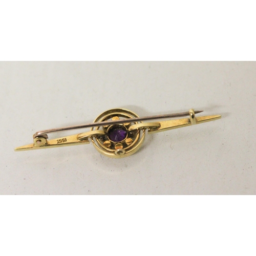 607 - An Edwardian 15ct gold amethyst and seed pearl circular cluster bar brooch. Marked 15ct, 55mm long, ... 