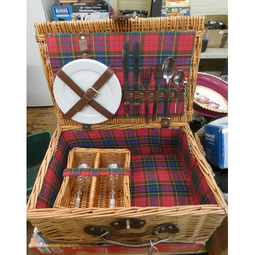 804 - A wicker cased picnic hamper...