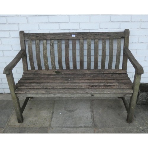 428 - A teak garden bench