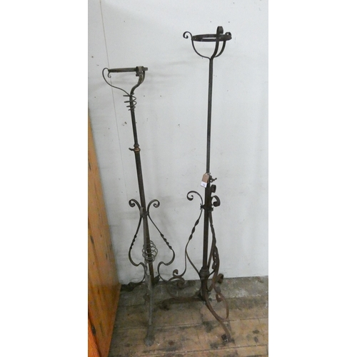 150 - Two Victorian iron adjustable lamp standards