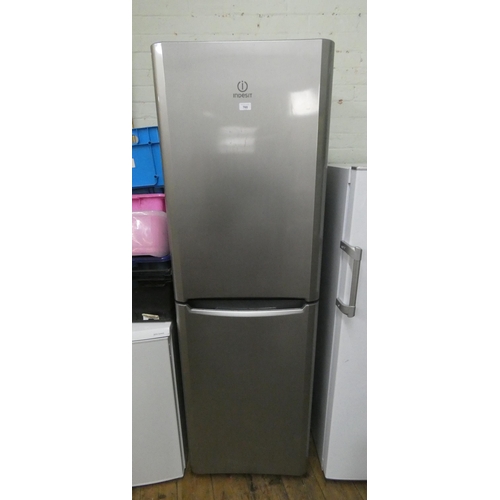 760 - A tall half and half Indesit fridge freezer in silver case