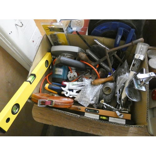 784 - A box of tools to include spanners, hammers, spirit levels, tapes, oil cans, a small skill saw, two ... 