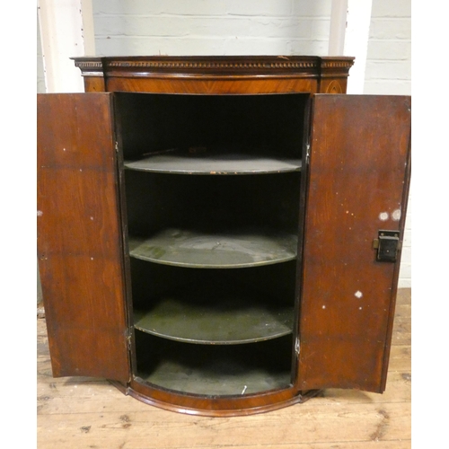 166 - A Georgian mahogany and satin wood strung hanging corner cabinet with shell inlay