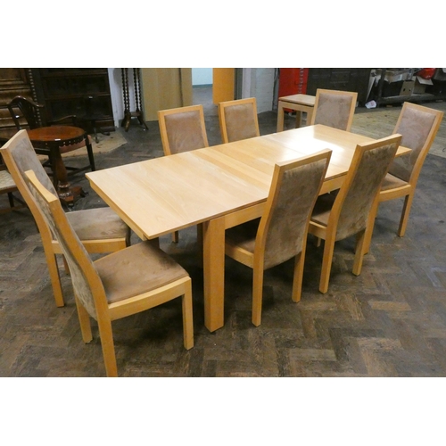 290 - A modern Ercol extending rectangular dining table together with a set of eight dining chairs upholst... 