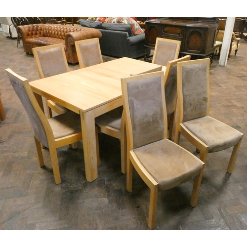 290 - A modern Ercol extending rectangular dining table together with a set of eight dining chairs upholst... 