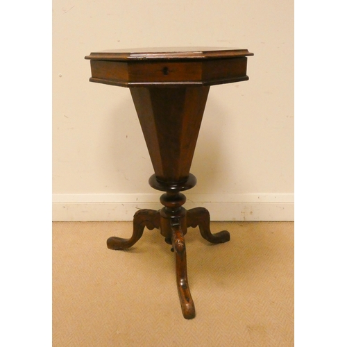 305 - A Victorian walnut octagonal sewing box on a tripod base, lifting lid containing various vintage cot... 