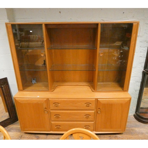 312 - A modern Ercol elm sideboard display cabinet, 61