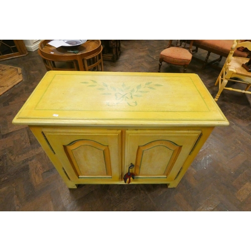 330 - A continental painted side cabinet fitted two doors with floral decoration