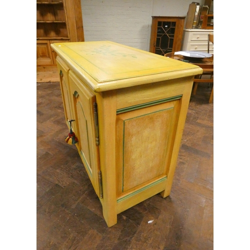 330 - A continental painted side cabinet fitted two doors with floral decoration