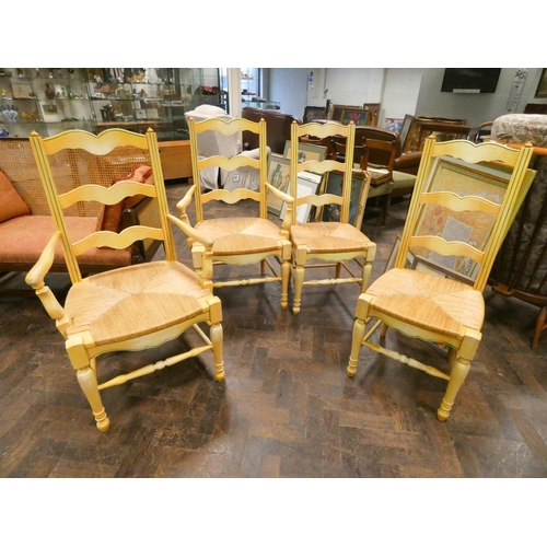 332 - A set of four painted finished continental ladder back kitchen chairs comprising of a pair of open a... 