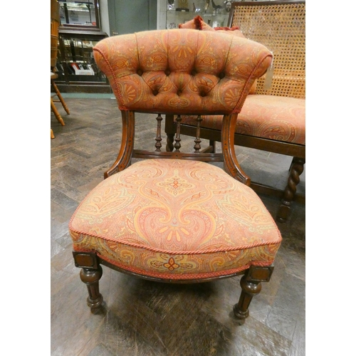 342 - A small late Victorian nursing chair in buttoned paisley fabric