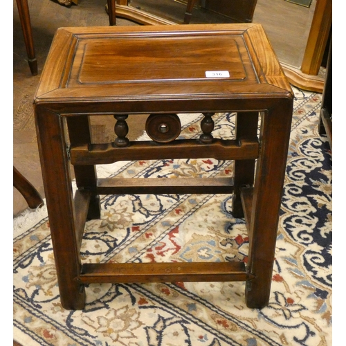 316 - A Chinese carved hardwood occasional table