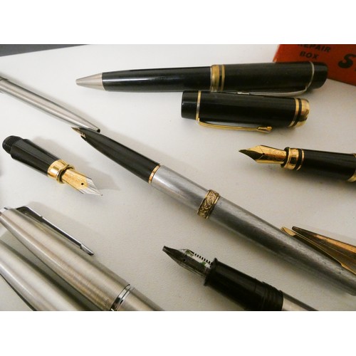 247 - A collection of vintage fountain and ballpoint pens