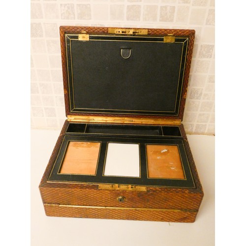 248 - A Victorian embossed brown leather travelling stationery writing box with brass brahma locks, 14