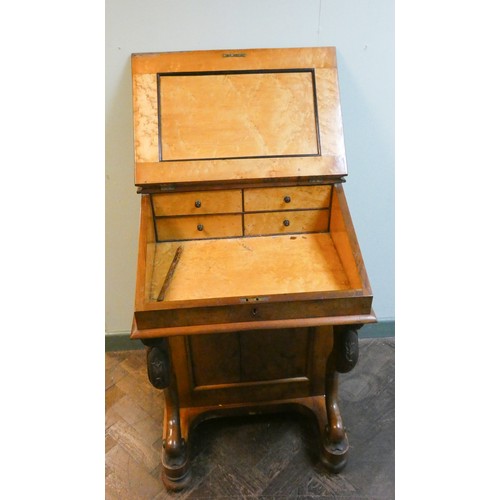 360 - A late Victorian walnut Davenport desk with a burr maple interior