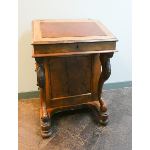 360 - A late Victorian walnut Davenport desk with a burr maple interior