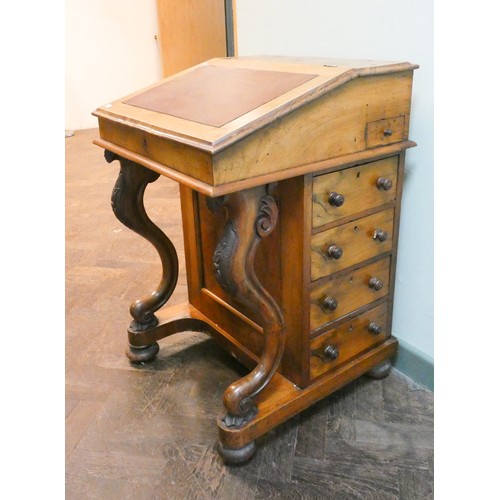 360 - A late Victorian walnut Davenport desk with a burr maple interior