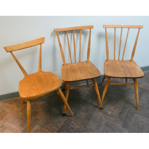 361 - An pair of Ercol vintage stick back dining chairs and a Ercol stacking chair