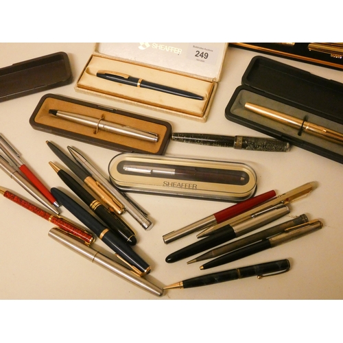 249 - A collection of vintage fountain and ballpoint pens