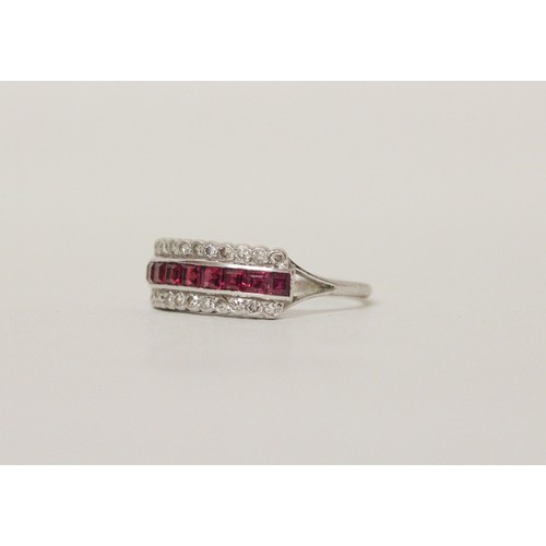 551 - An Art Deco ruby and diamond triple-row half eternity ring, circa 1925, channel and pave set with ca... 