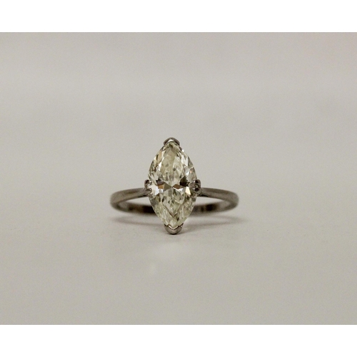 547 - A large marquise diamond solitaire ring, the diamond estimated to weigh 2.5 carats, in raised claw s... 