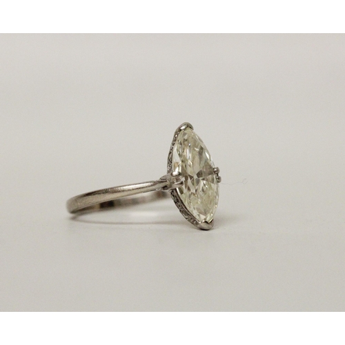 547 - A large marquise diamond solitaire ring, the diamond estimated to weigh 2.5 carats, in raised claw s...