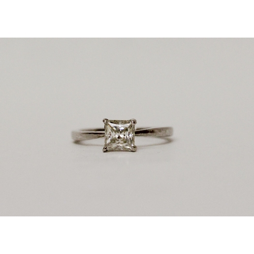 556 - A modern princess cut diamond solitaire engagement ring, the claw set diamond weighing 0.8 carats on...