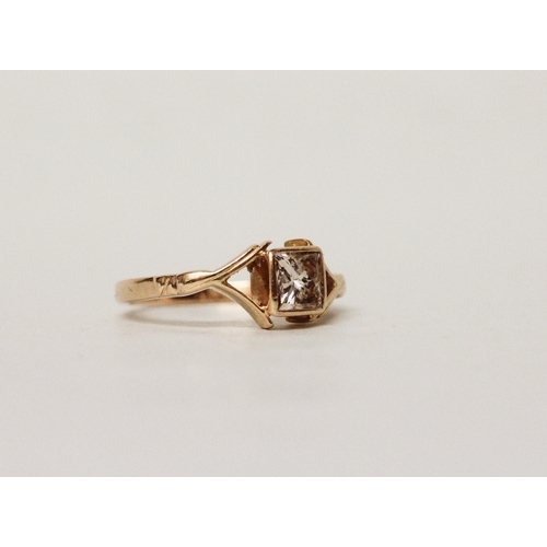 562 - A modern 18ct rose gold and princess cut diamond ring, ring size P, 4.6 grams...