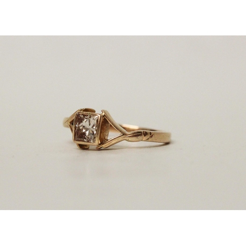 562 - A modern 18ct rose gold and princess cut diamond ring, ring size P, 4.6 grams...