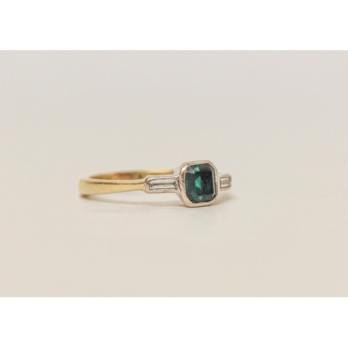 578 - An emerald and diamond Art Deco design ring on hallmarked 18ct yellow gold band. Ring size Q, 4.3 gr... 