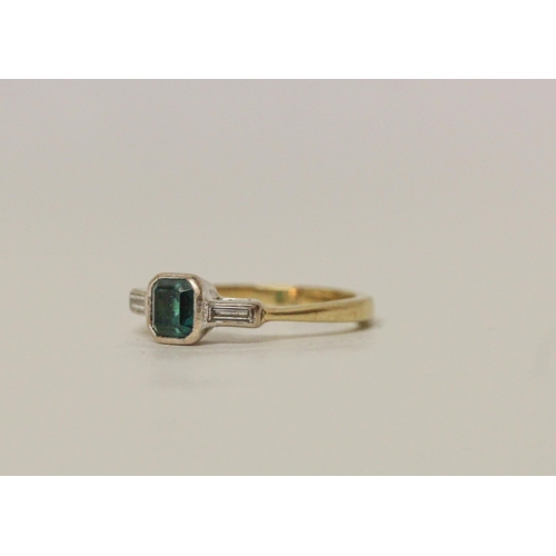 578 - An emerald and diamond Art Deco design ring on hallmarked 18ct yellow gold band. Ring size Q, 4.3 gr... 