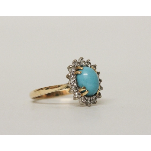 598 - A turquoise and diamond oval dress ring on hallmarked 18ct yellow gold band, ring size O, 5.2 grams