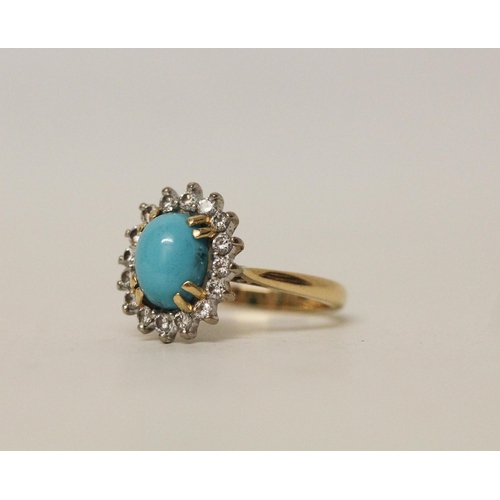 598 - A turquoise and diamond oval dress ring on hallmarked 18ct yellow gold band, ring size O, 5.2 grams