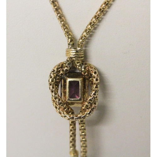 614 - A Victorian design 18ct yellow gold and amethyst pendant necklace, hallmarked on clasp, 11.8 grams