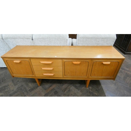 46 - A modern long teak sideboard fitted three drawers and cupboards, 6' long