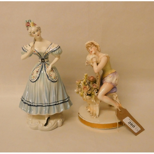 260 - A German porcelain figurine of a Pierrot scantily clad female and a Goldschieder Everlast model of a... 