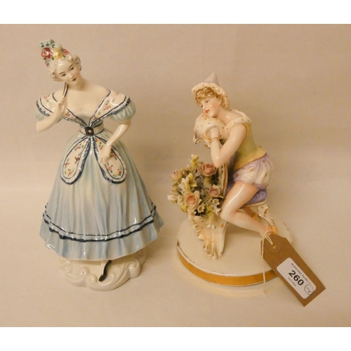 260 - A German porcelain figurine of a Pierrot scantily clad female and a Goldschieder Everlast model of a... 