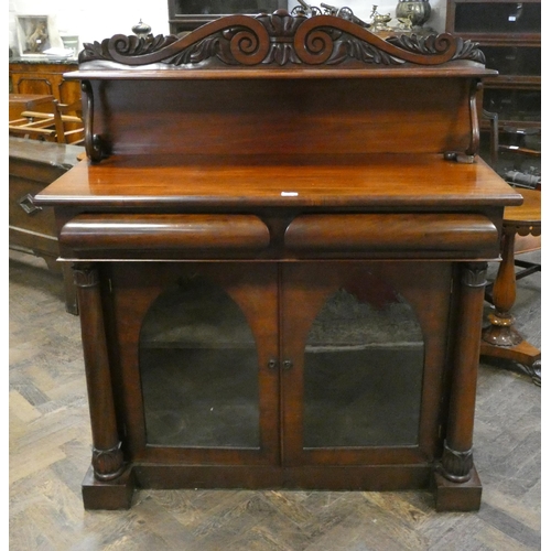 367 - A Victorian mahogany chiffonier with shelf back, two frieze drawers and glazed gothic arched doors b... 