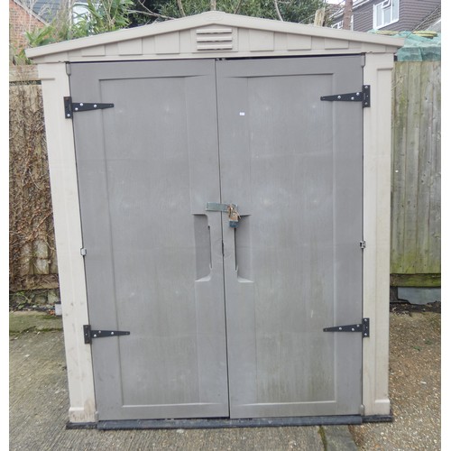 753 - A large plastic garden shed or storage unit with interior floor 65