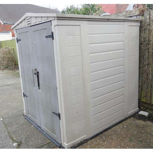 753 - A large plastic garden shed or storage unit with interior floor 65