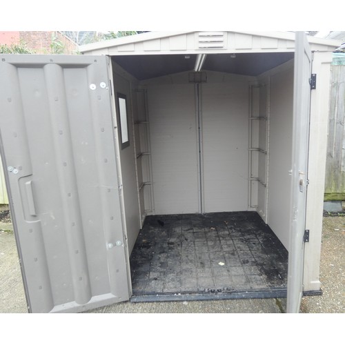 753 - A large plastic garden shed or storage unit with interior floor 65